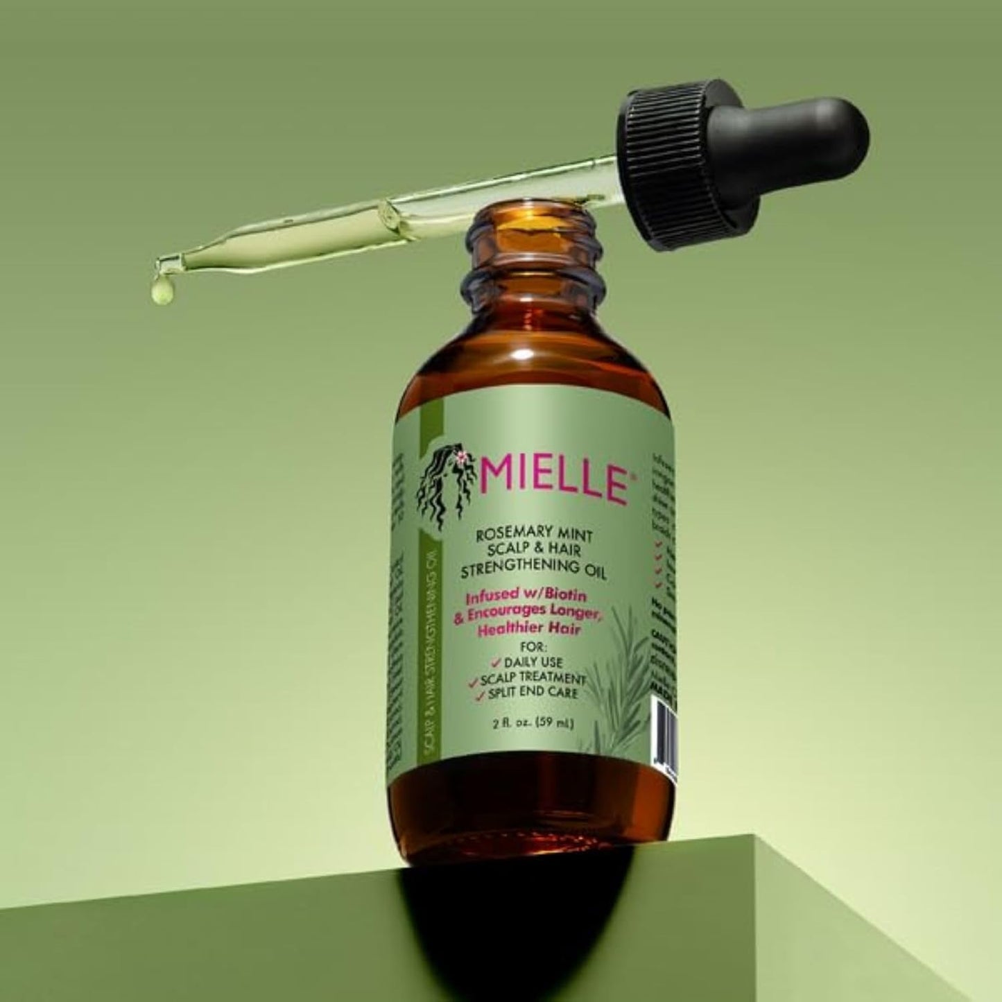 Mielle Scalp & Hair Strengthening Rosemary Mint Oil.